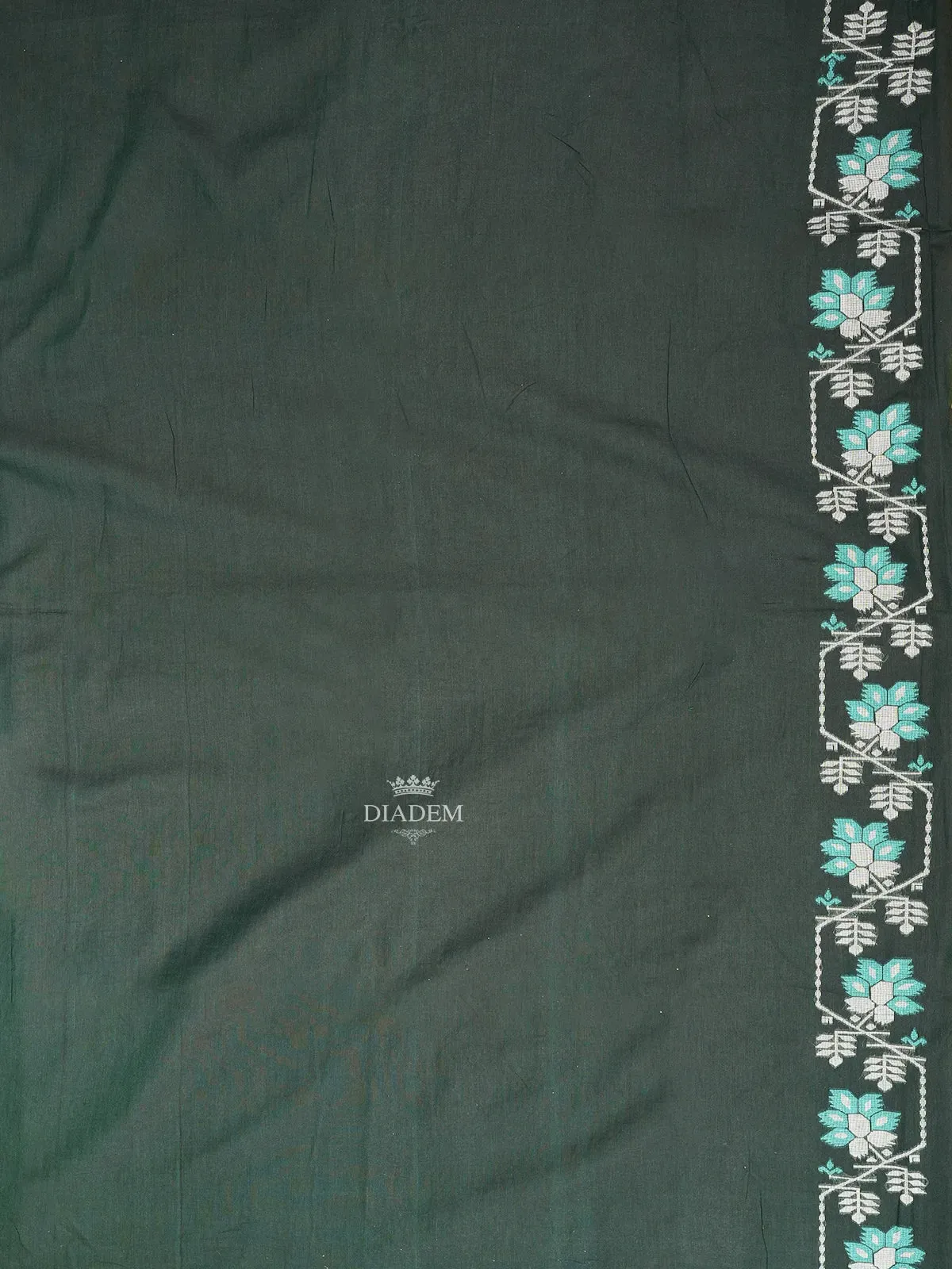 Dark Green Linen Cotton Saree with Floral Patterns on the Body with Designed Border